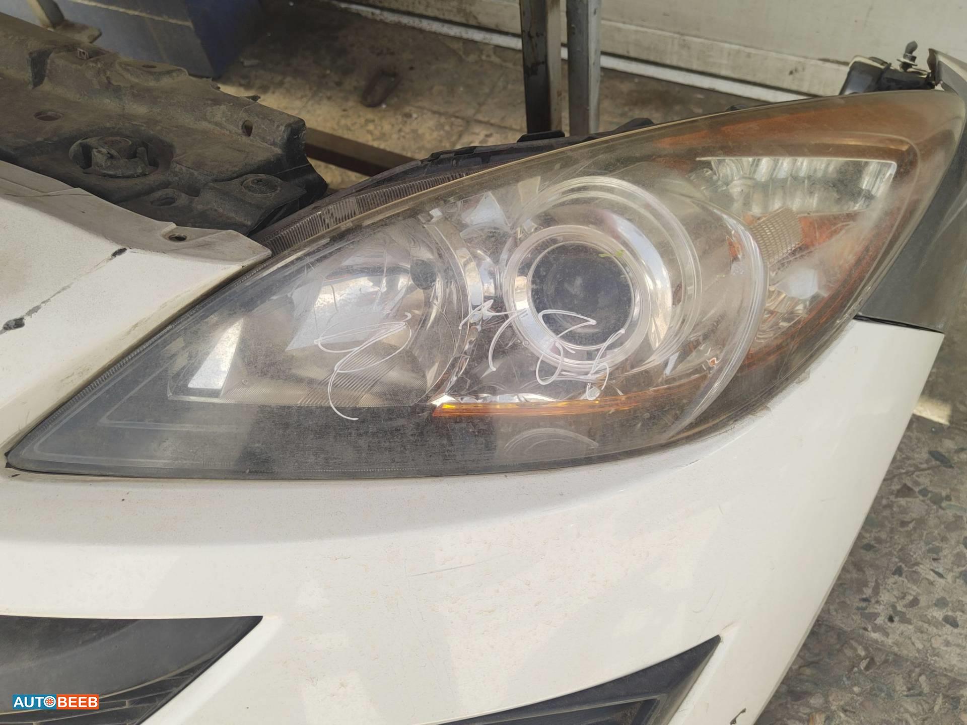 ضوء امامي شمال مازدا 3 2013 2014