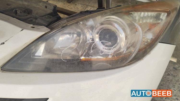 ضوء امامي شمال مازدا 3 2013 2014