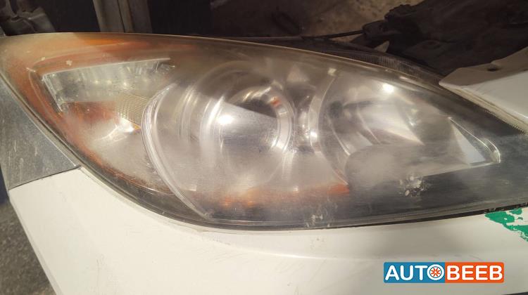 ضوء امامي يمين مازدا 3 2013 2014