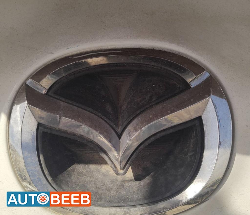 شعار طمبون امامي مازدا 3 2013 2014