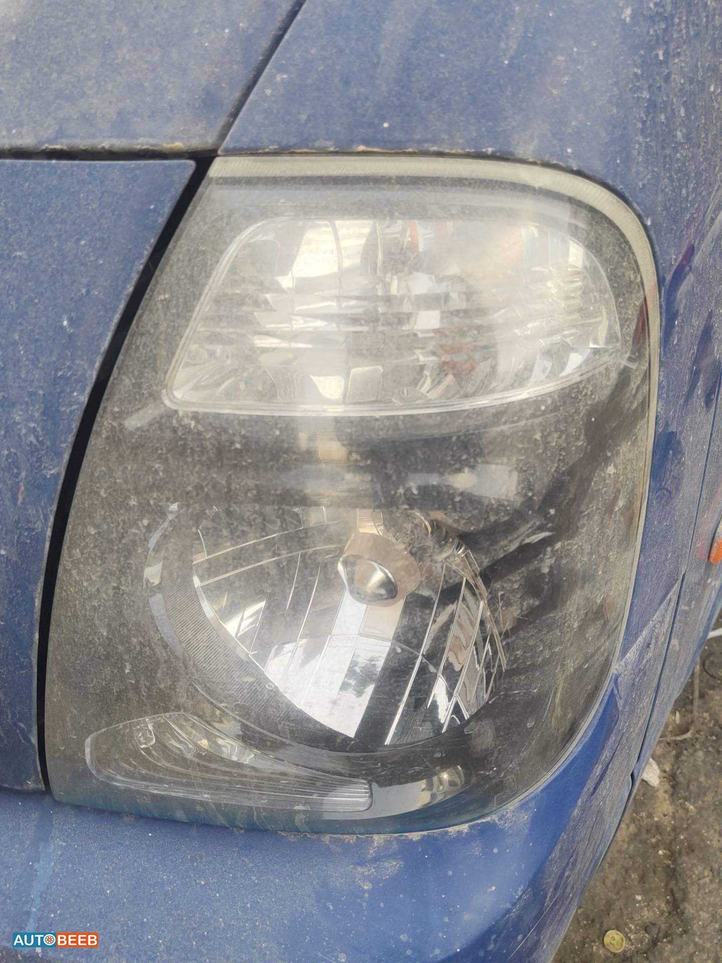 ضوء امامي شمال كيا بنجو 3 2014 2015