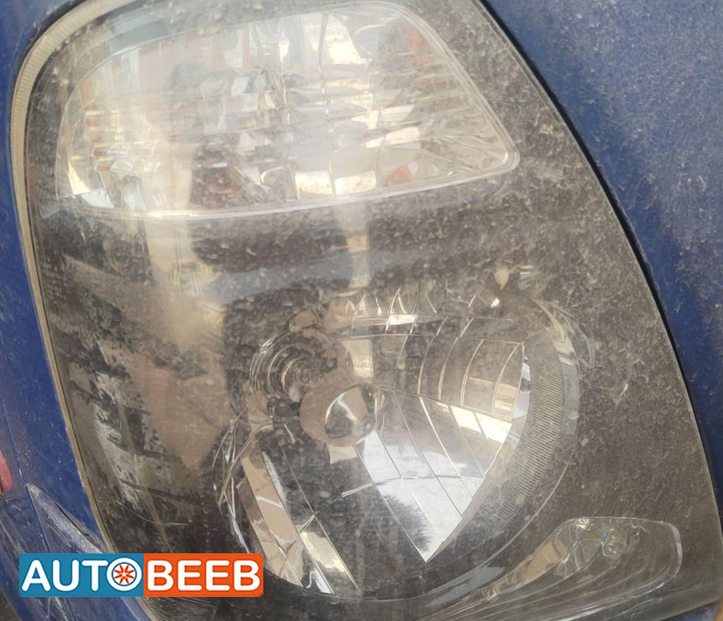 ضوء امامي يمين كيا بنجو 3 2014 2015