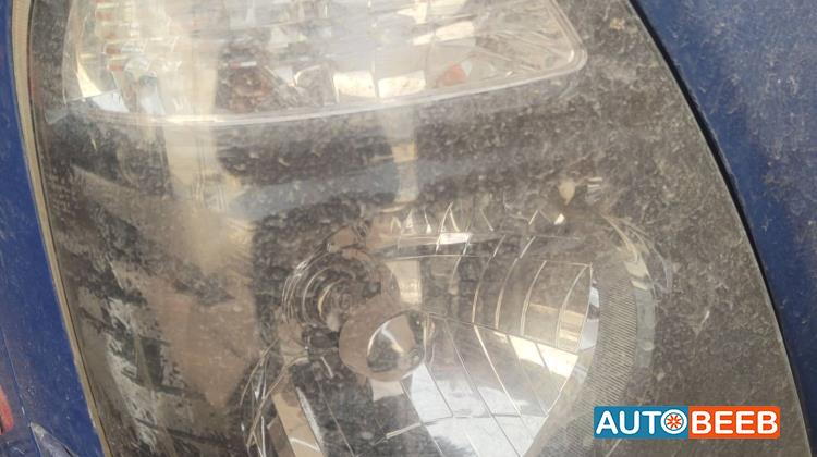 ضوء امامي يمين كيا بنجو 3 2014 2015