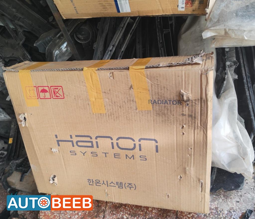 روديتر ماء هيونداي اكسنت 2012 2013