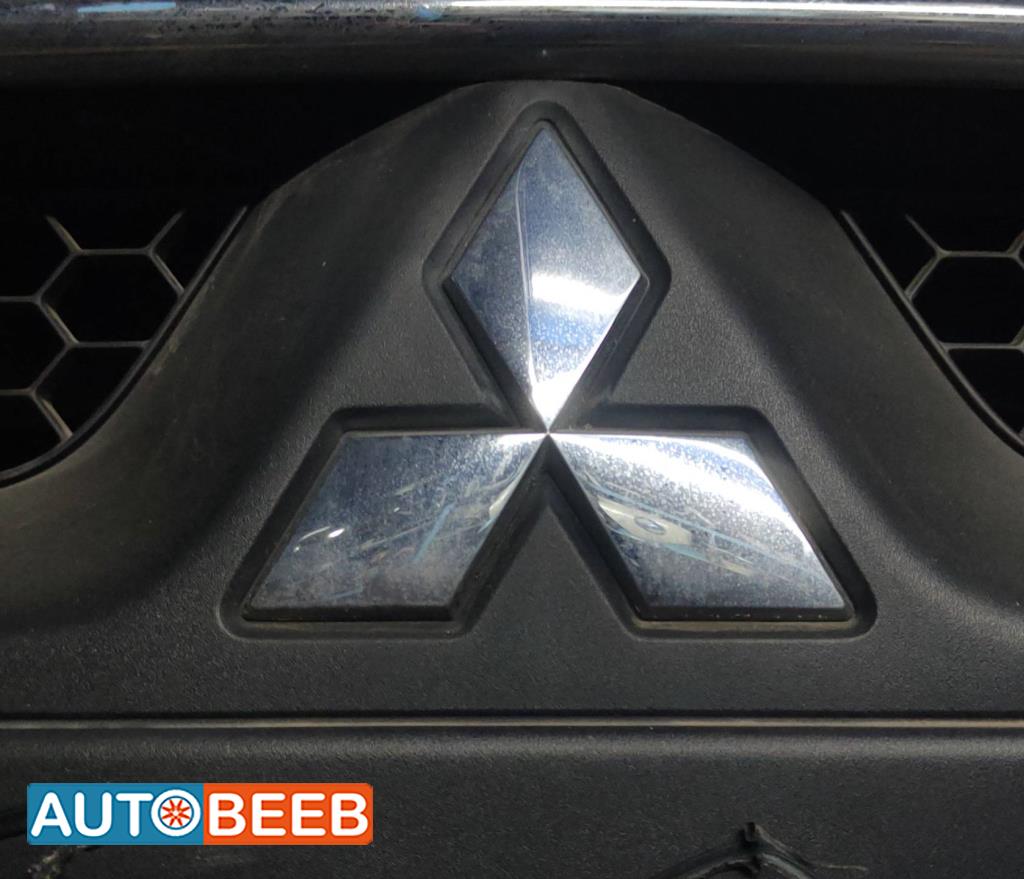 شعار طمبون امامي ميتسوبيشي لانسر ex 2010 2011