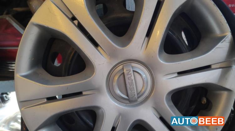 طاسة عجل نيسان صني 2001 2002