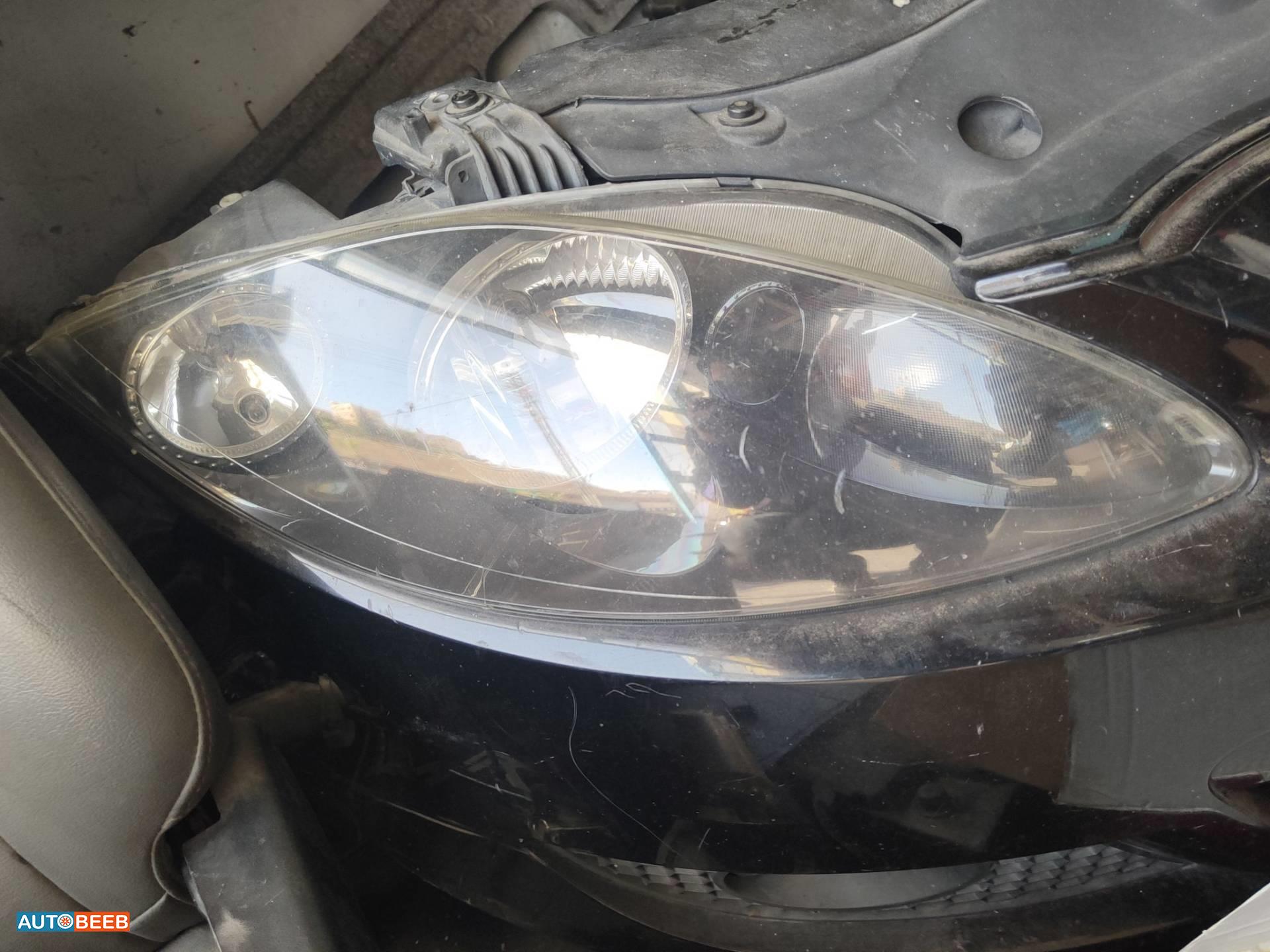 ضوء امامي يمين سيات ليون 2009 2010