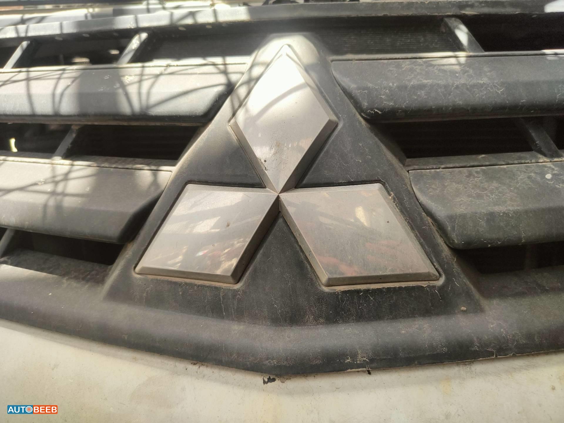 شعار طمبون امامي ميتسوبيشي l200 2011 2012 2013 2014