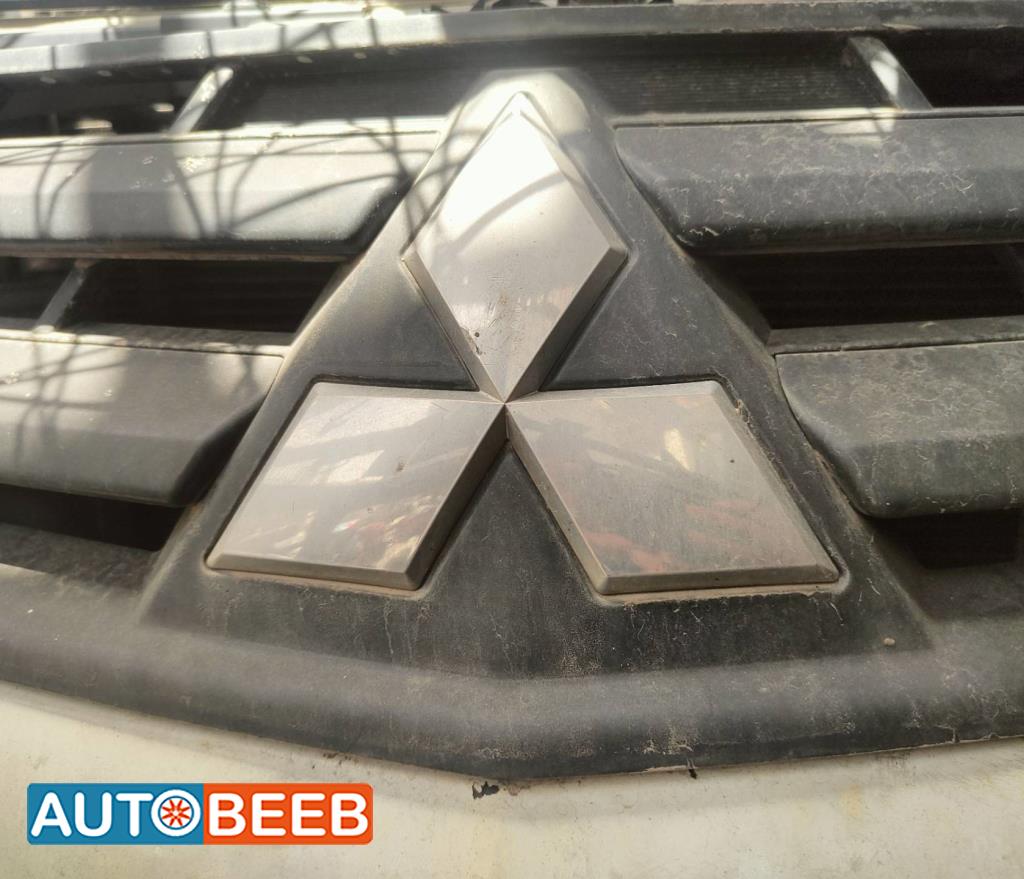 شعار طمبون امامي ميتسوبيشي l200 2011 2012 2013 2014