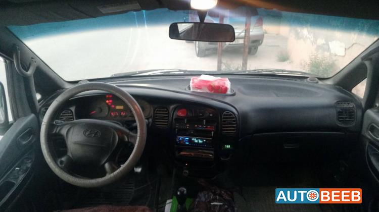 ميني باص هيونداي 2004