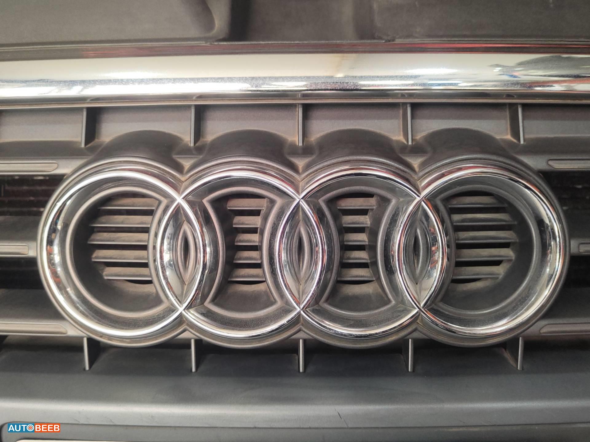 شعار طمبون امامي اودي a4 2010 2011