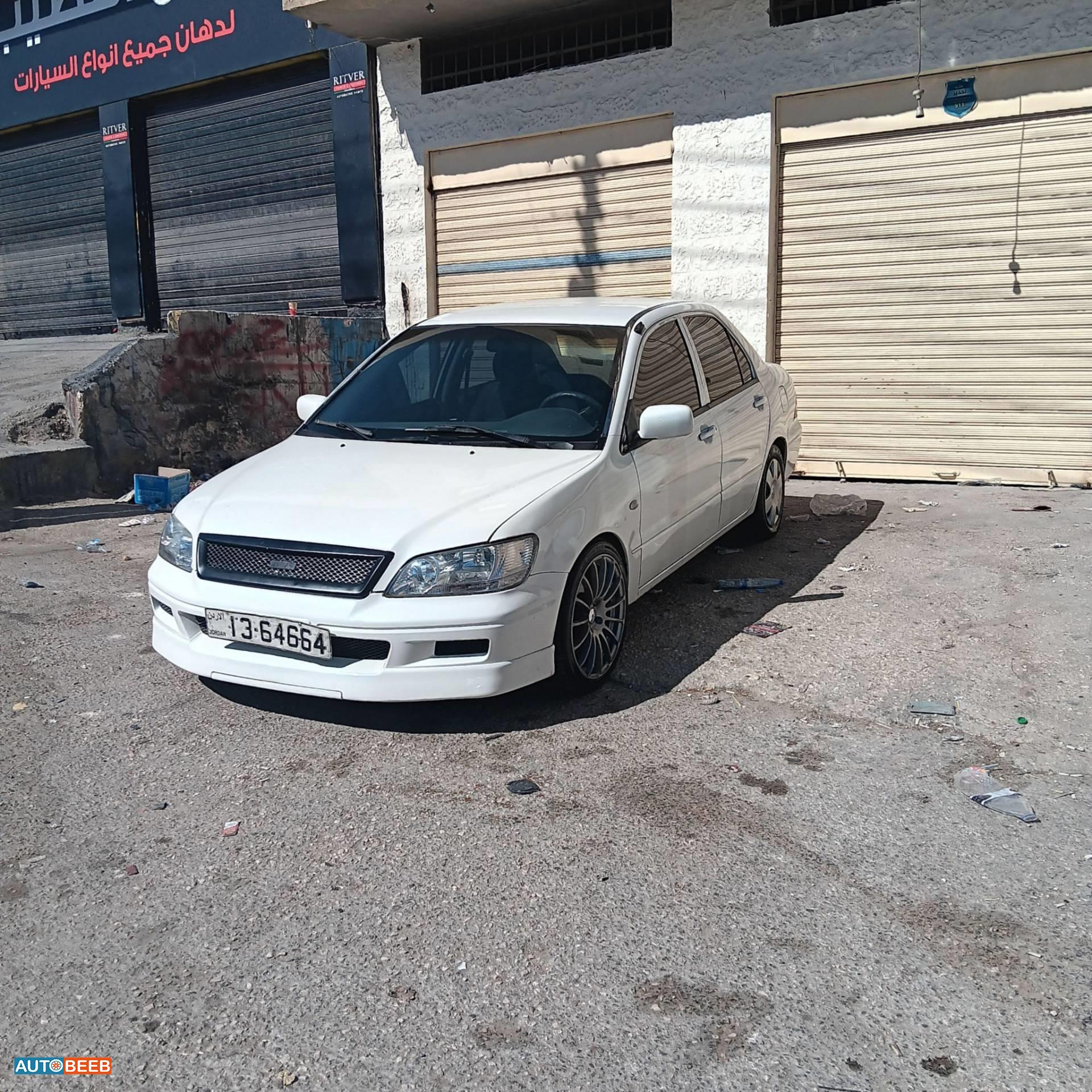ميتسوبيشي لانسر 2003