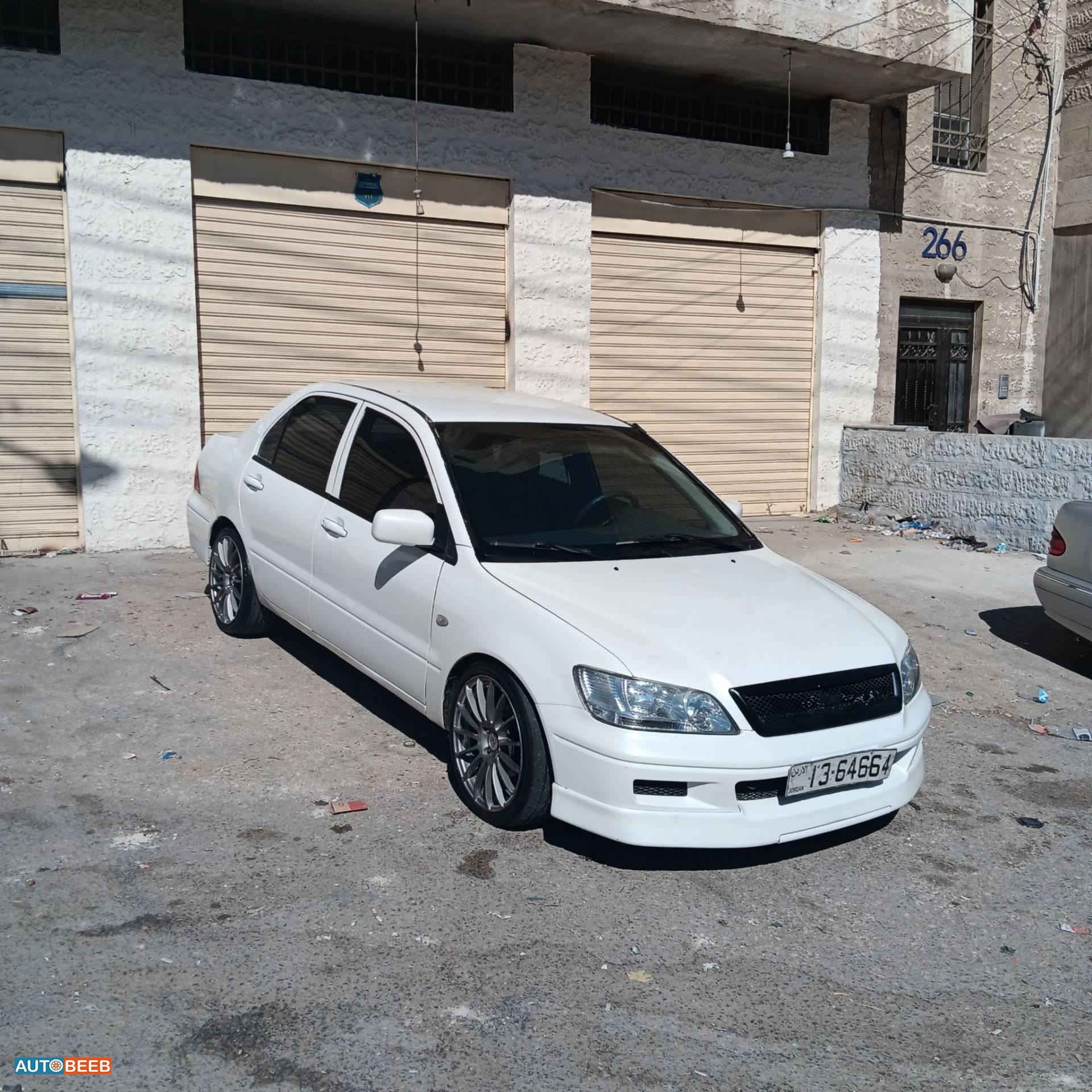 ميتسوبيشي لانسر 2003