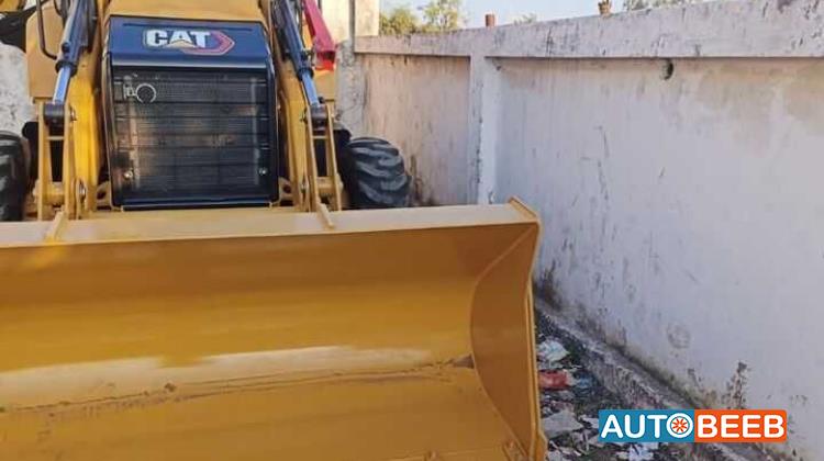 باك لودر كاتربيلر 2024