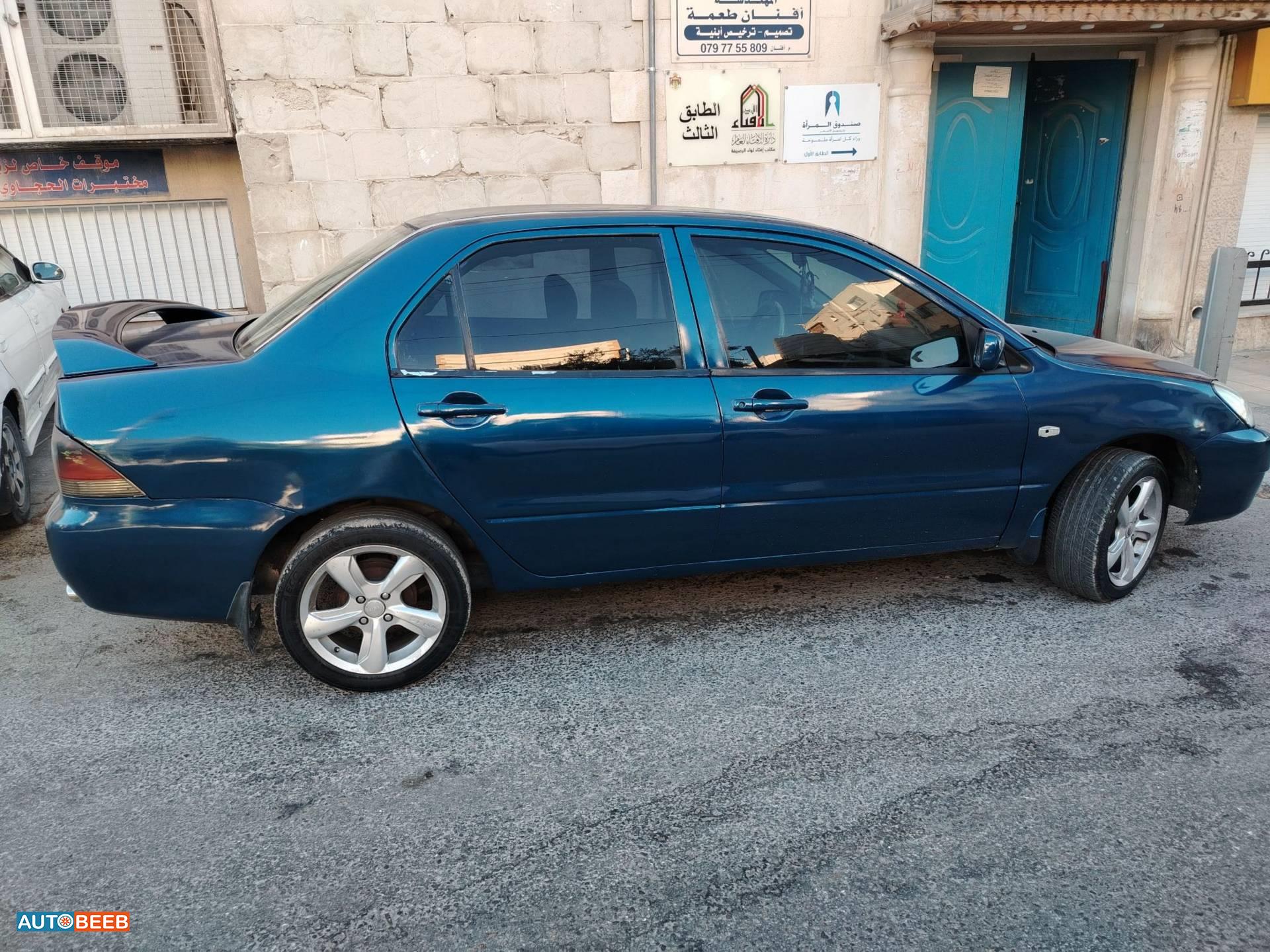 ميتسوبيشي لانسر 2004
