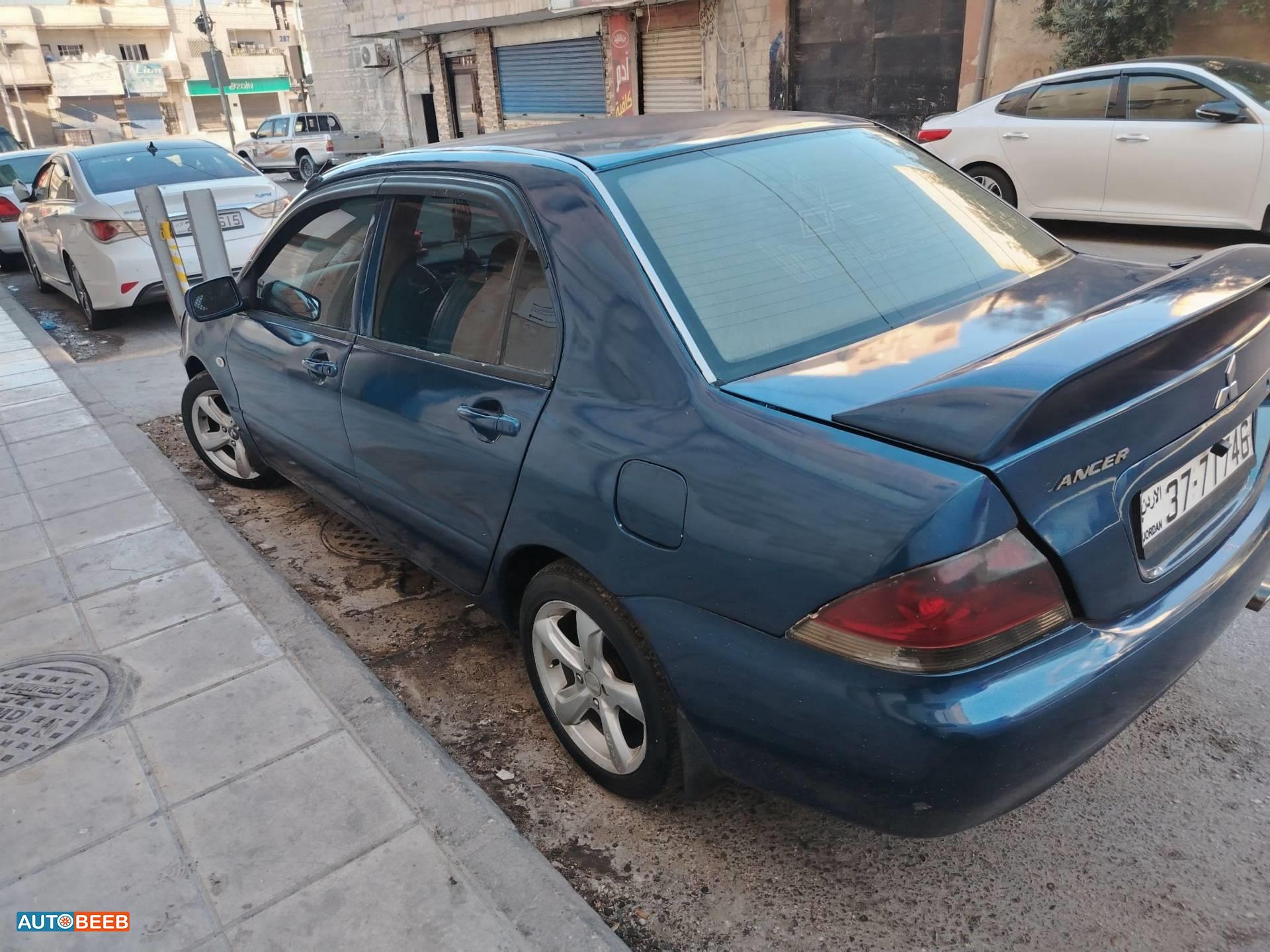 ميتسوبيشي لانسر 2004