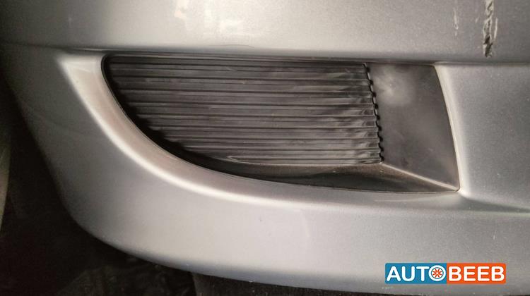 تسكيرة طمبون امامي يمين ميتسوبيشي لانسر glx 2005 2006 2007 2008