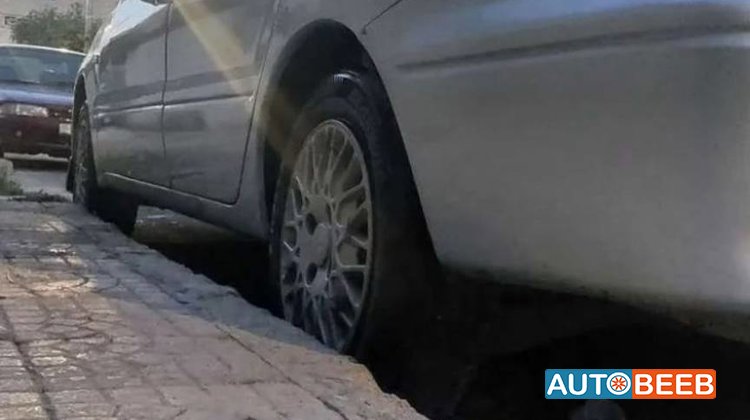 ميتسوبيشي لانسر 2003
