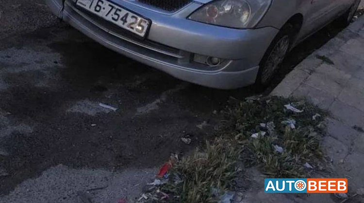 ميتسوبيشي لانسر 2003